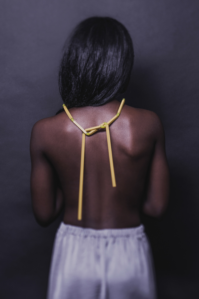 Flexible Necklace, made from Silicone and powdercoated Brass mady by Lena Wunderlich
